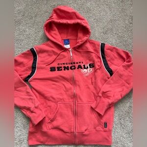 #140 Cincinnati Bengals Hoodie peaches-orangish-apricot in color. Women’s.